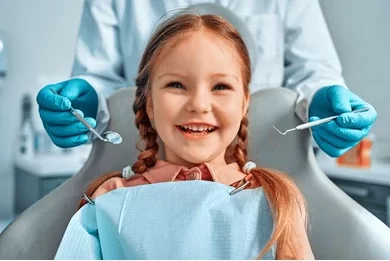 Baby receiving dental care from pediatric dentist for tooth decay prevention